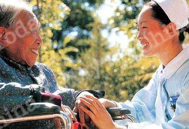 
A resident and nurse at Beijing's Songtang Hospice.
